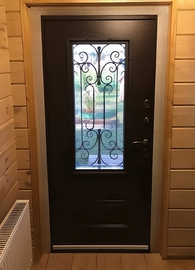 Дверь с ковкой и стеклопакетом, вид из помещения