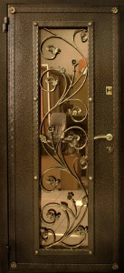 фото металлическая дверь с ковкой